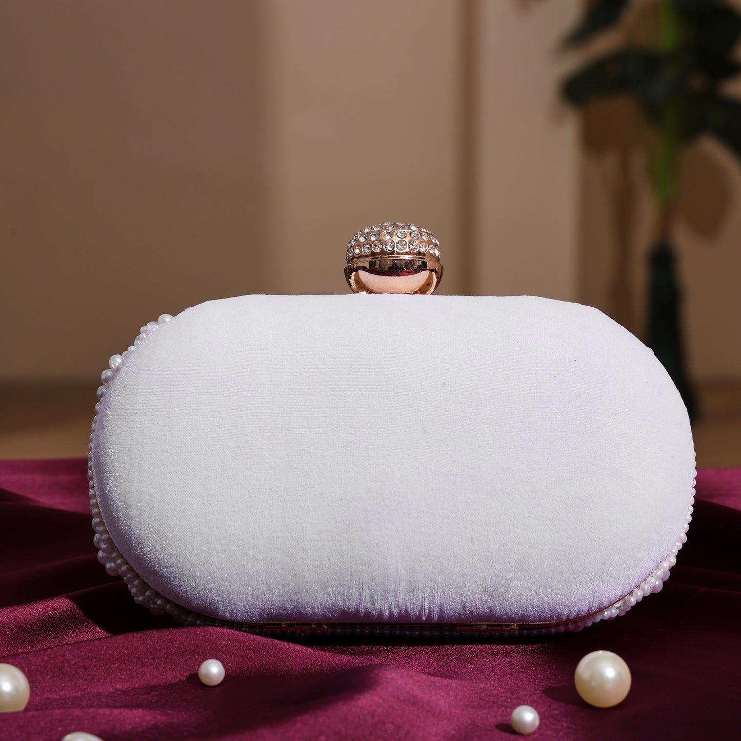 Royal Pearl Embellished Oval Clutch with Crystal Closure