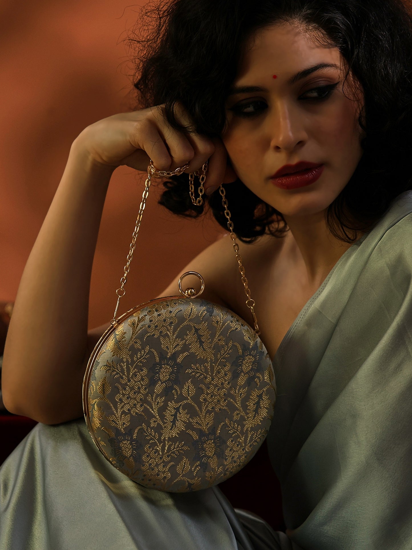 Heritage Luxe Round Floral Embroidered Clutch with Metallic Accents